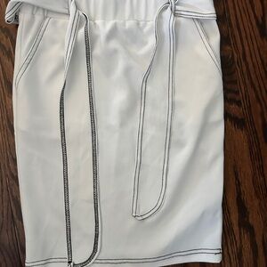 White Skirt with dark blue Stitching and pockets - never worn size Small